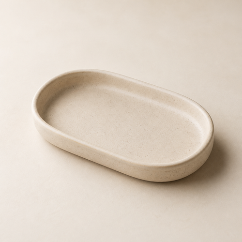 Warm ivory Averlomia Ceramic Catchall Tray on a soft studio background