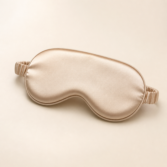 Champagne beige Averlomia Satin Sleep Mask on an ivory studio background